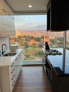 Dapur atau dapur kecil di The Cube 11, 2-BR in Sin El Fil