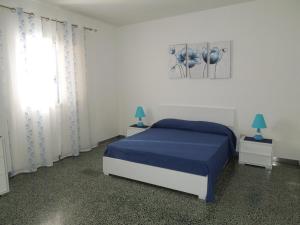 Postel nebo postele na pokoji v ubytování A cà da Angioletta