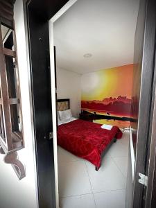 Postel nebo postele na pokoji v ubytování Hotel Chicala