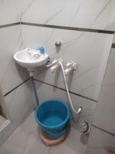 Koupelna v ubytování Shri Radha Ballabh Kunj Seva SADAN