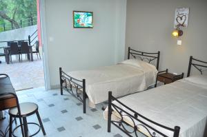 Afbeelding uit fotogalerij van Kontogialos Pool Apartments in Pelekas +60 foto's