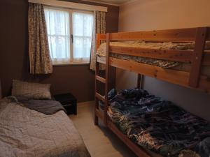 Postel nebo postele na pokoji v ubytování Cama