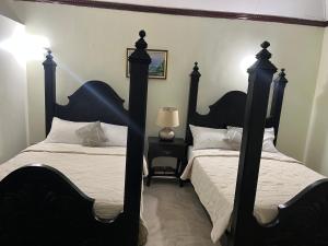 Ein Bett oder Betten in einem Zimmer der Unterkunft Starlight Chalet & Health Spa