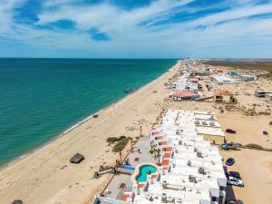 an aerial view of a beach with umbrellas at Paradise Villas #16 in Playa Encanto