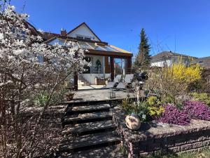 Κήπος έξω από το Haus Ostseesprung - Fewo Sarah Hochparterre gratis WLAN, Parkplatz und gem Garten