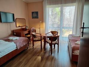 Postel nebo postele na pokoji v ubytování Willa Kliper + 37 fotografií