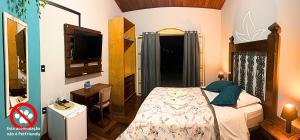 Postel nebo postele na pokoji v ubytování POUSADA NATIVA + 49 fotografií