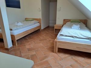 Postel nebo postele na pokoji v ubytování Modrá Hortenzie