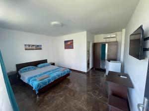 Postel nebo postele na pokoji v ubytování Quantum villa