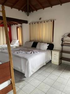 Ένα ή περισσότερα κρεβάτια σε δωμάτιο στο Loft25