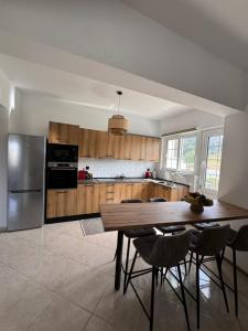 Kuchyň nebo kuchyňský kout v ubytování Jojo's Home