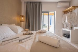 Postel nebo postele na pokoji v ubytování Kastraki Riviera