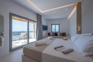 Postel nebo postele na pokoji v ubytování Kastraki Riviera + 37 fotografií
