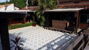 an empty courtyard in a house with a building at Sítio do casarão in Ananindeua