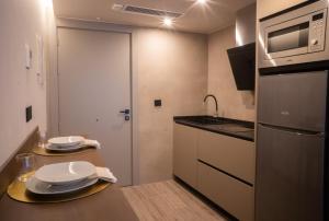 Kuchyň nebo kuchyňský kout v ubytování Almazara Suites + 17 fotografií