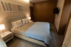 Ένα ή περισσότερα κρεβάτια σε δωμάτιο στο Encanto do Douro Antigo