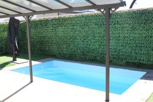 Πισίνα στο ή κοντά στο casita de muñecas