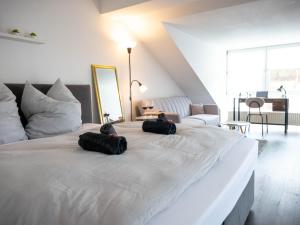 Postel nebo postele na pokoji v ubytování Studio mit Balkon