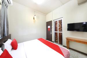 TV a/nebo společenská místnost v ubytování OYO 507 Aikka Hotel