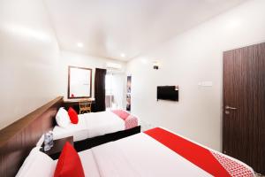 TV a/nebo společenská místnost v ubytování OYO 507 Aikka Hotel