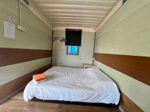 Postel nebo postele na pokoji v ubytování OYO 91028 Ting Brother Sg Klah Inn
