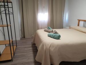 Cama o camas de una habitación en Evangelista59