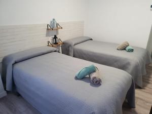Cama o camas de una habitación en Evangelista59