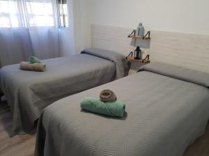 Cama o camas de una habitación en Evangelista59