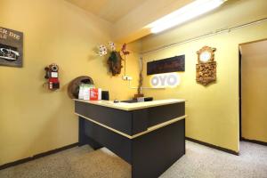 TV a/nebo společenská místnost v ubytování OYO 507 Aikka Hotel