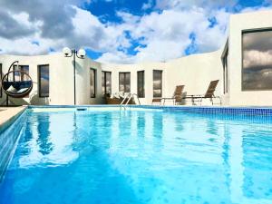 Piscina de la sau aproape de 1001A - Rentaqui Apartamento Diamond Green