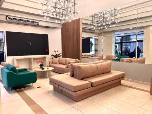 O zonă de relaxare la 1001A - Rentaqui Apartamento Diamond Green