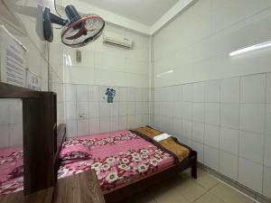 Postel nebo postele na pokoji v ubytování SPOT ON 1188 Motel Hoa Cam