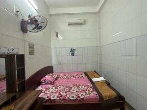 Postel nebo postele na pokoji v ubytování SPOT ON 1188 Motel Hoa Cam