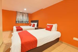 Postel nebo postele na pokoji v ubytování OYO 90732 New Hotel 33