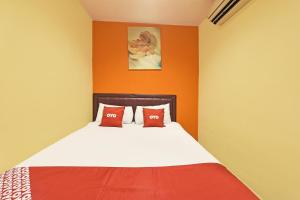 Postel nebo postele na pokoji v ubytování OYO 90732 New Hotel 33