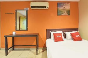 Postel nebo postele na pokoji v ubytování OYO 90732 New Hotel 33