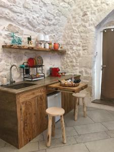 Kuchyň nebo kuchyňský kout v ubytování Luxury Suite Of Ostuni + 17 fotografií