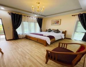 Gallery image of Capital O 75518 Baan Rose Resort Ao Luk in Ao Luk
