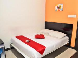 Letto o letti in una camera di OYO 91087 Hotel Dspark Port Klang