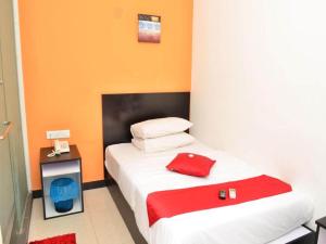 Letto o letti in una camera di OYO 91087 Hotel Dspark Port Klang
