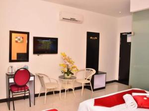 Letto o letti in una camera di OYO 91087 Hotel Dspark Port Klang