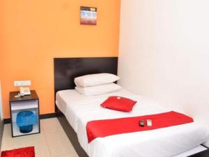 Letto o letti in una camera di OYO 91087 Hotel Dspark Port Klang