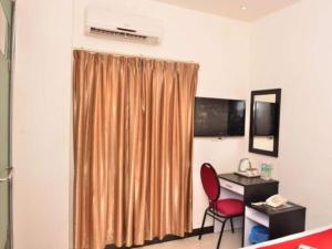 TV o dispositivi per l'intrattenimento presso OYO 91087 Hotel Dspark Port Klang