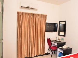 TV o dispositivi per l'intrattenimento presso OYO 91087 Hotel Dspark Port Klang