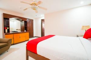 Postel nebo postele na pokoji v ubytování OYO 236 Hotel Edmundo
