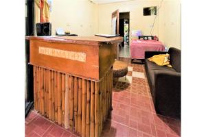 Postel nebo postele na pokoji v ubytování OYO 876 Escurel Inn Boracay