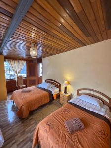 Postel nebo postele na pokoji v ubytování Hotel Donde Ivan