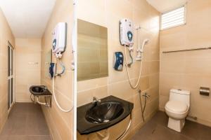 Koupelna v ubytování OYO 1185 Ho Hotel