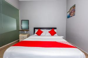 Postel nebo postele na pokoji v ubytování OYO 1185 Ho Hotel