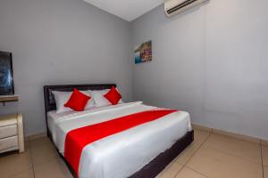 Postel nebo postele na pokoji v ubytování OYO 1185 Ho Hotel